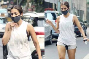 Bandra Diaries: Malaika puts on her shoes, takes a walk after recovery