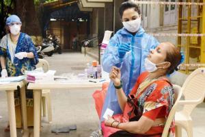 Number of daily COVID-19 cases in Maharashtra dips to 13,702