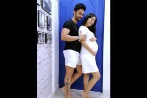 Amrita Rao poses with a baby bump, says 'the Baby is Coming Soon'