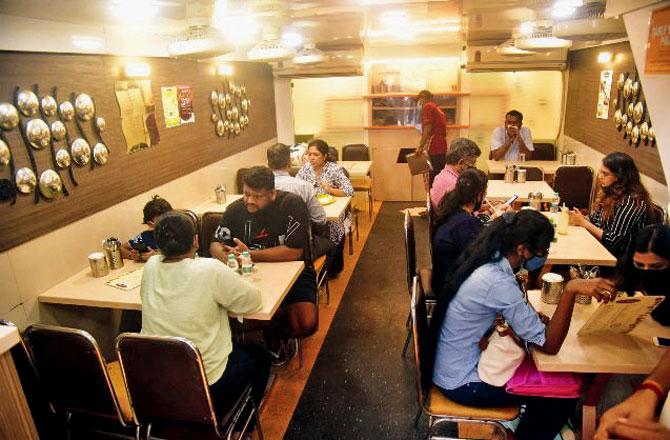 The owner of Arya Bhavan, Matunga East, said only two people are allowed to sit at each table