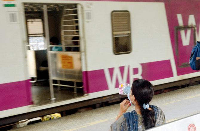 A woman commuter at Kandivli railway station