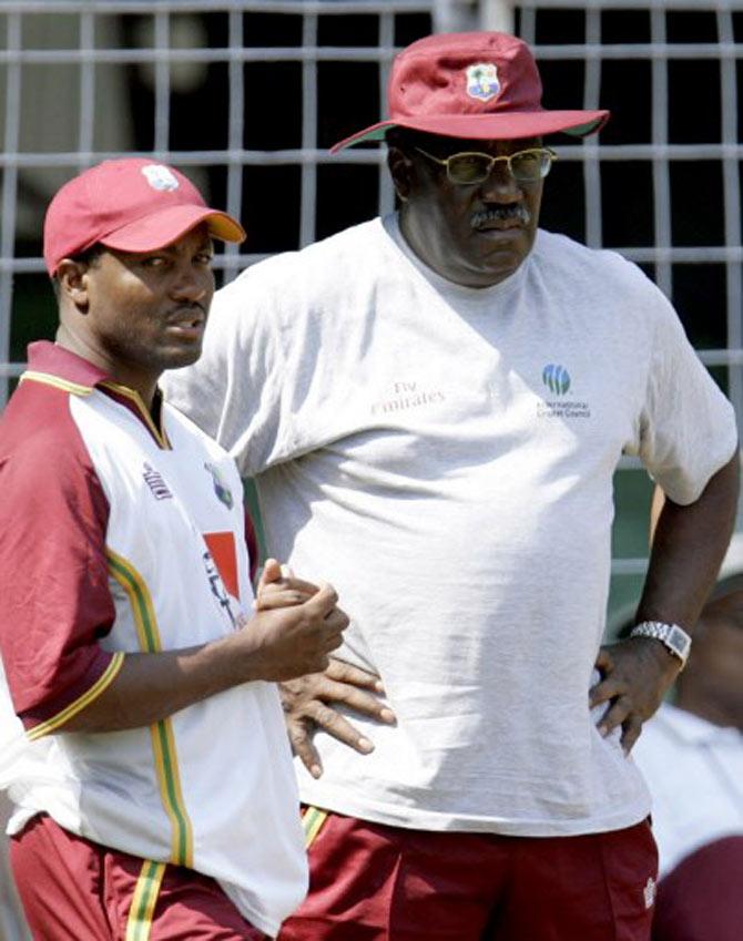 In picture: Former West Indies cricket captain Brian Lara (L) speaks with Clive Lloyd (R) during a practice session in Mumbai, 16 October 2006.