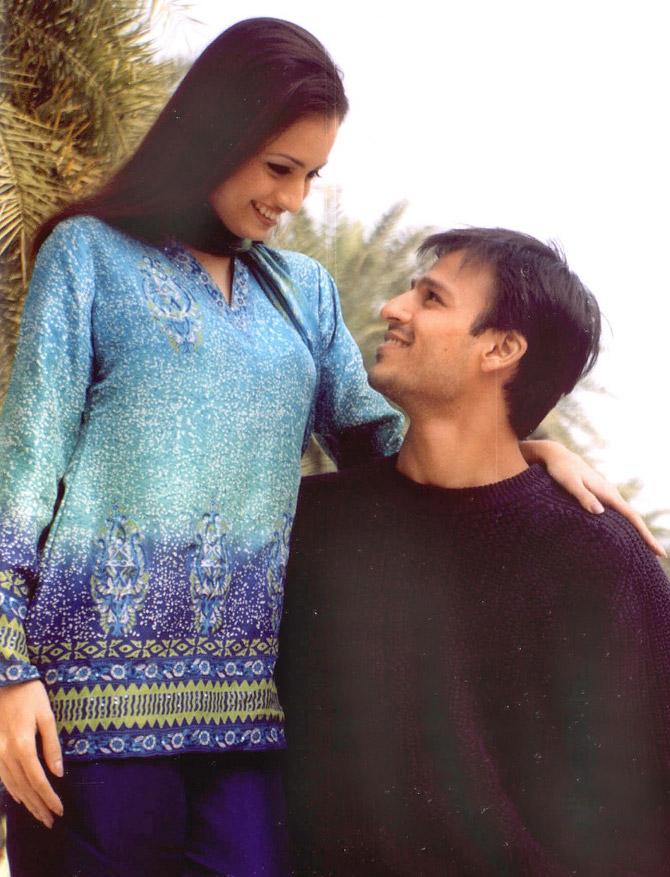 Vivek Oberoi tried to maintain variety - whether it was a gangster's part in Company, a lover boy in Saathiya or a villain in upcoming film Krrish 3. Vivek did not fear experimentation either - Yuva, Masti, Kaal, Omkara, Shootout at Lokhandwala, Kurbaan and Prince, all stand as examples. While some worked in his favour, others did not - but it has all been a learning experience for him.
In picture: Dia Mirza and Vivek Oberoi strike a pose for photographers during a photocall in Lucknow on January 9, 2003. The pair was promoting their film Dum.
