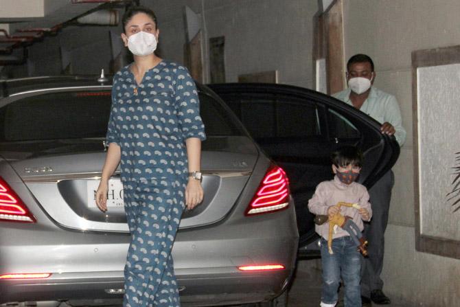 Kareena Kapoor Khan along with son Taimur Ali Khan was spotted at their residence in Bandra, Mumbai. The mom-to-be ooked fabulous in her designer blue printed co-ord set as she posed for the photographers. All pictures/Yogen Shah