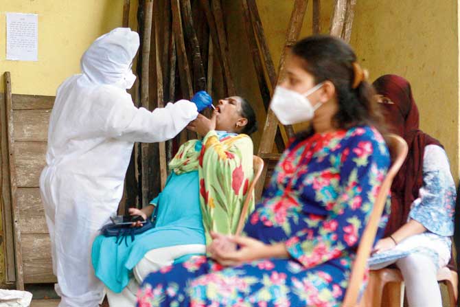 BMC health workers conduct a rapid antigen test Hafkin Gymkhana on Tuesday. PIC/ASHISH RAJE