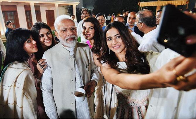 In picture: Actress Rakul Preet Singh and producer-director Ekta Kapoor pose for a selfie with PM Narendra Modi.