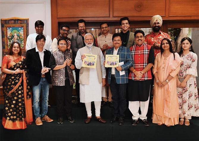 In picture: Modi poses with the team of Taarak Mehta Ka Ooltah Chashmah.