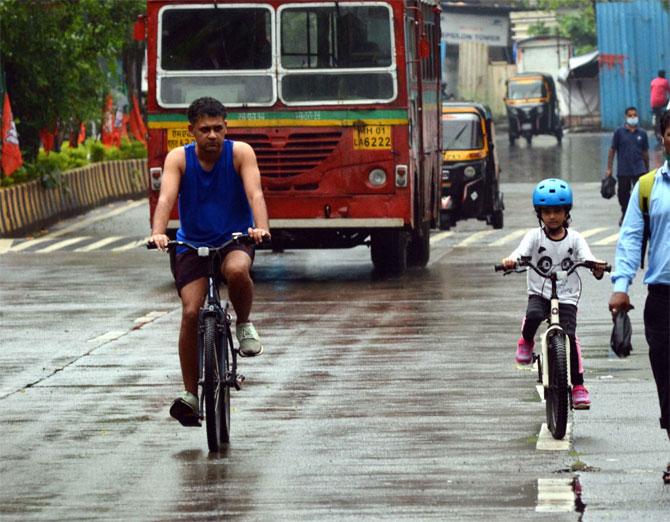 In picture: A father and daughter enjoy cycling at Thakur Village in Kandivali.