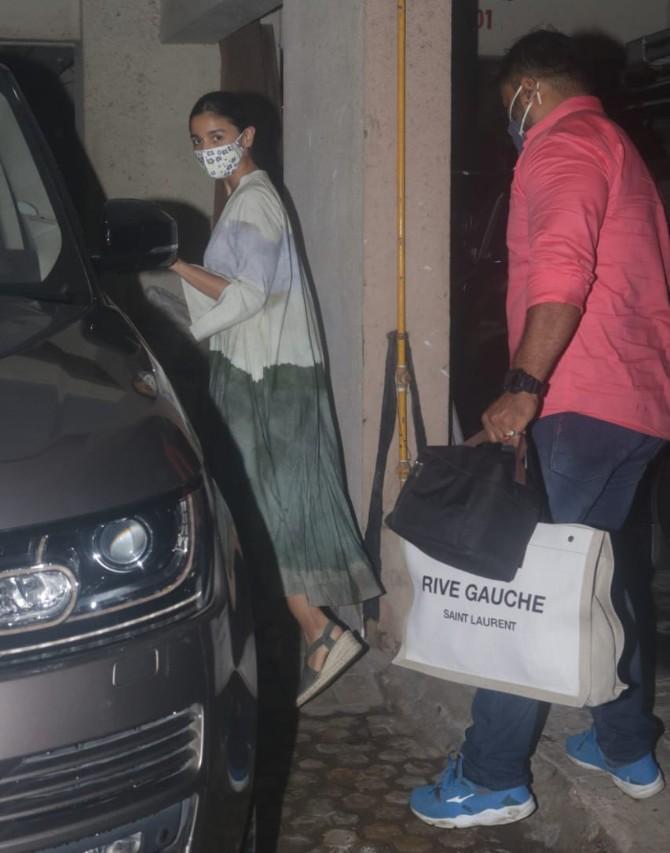 Alia Bhatt was clicked at her Gangubai Kathiawadi director Sanjay Leela Bhansali's office in Bandra, Mumbai. The actress looked simple-yet-elegant in her white top and green skirt. (All pictures: Yogen Shah).
