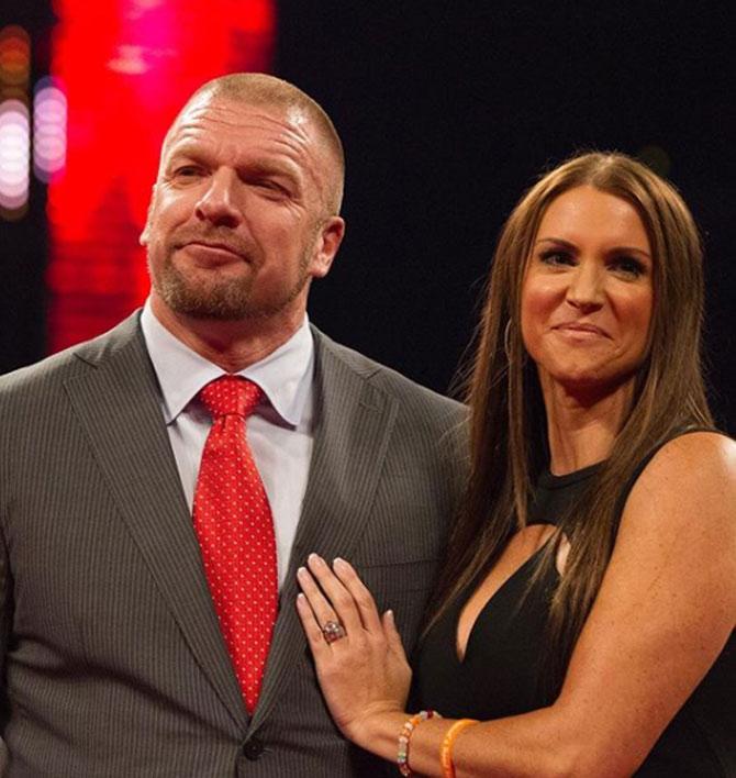 Stephanie McMahon and the three important men in her life!