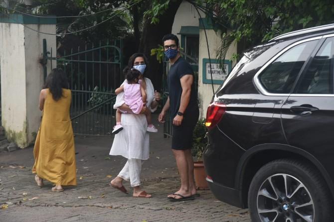 Dhupia opted for a traditional white salwar kameez for the outing, while Angad looked handsome in his black t-shirt and shorts. Little Mehr looked cute in her pink frock and white shoes. The family abided the government rules to prevent the spread of coronavirus. While Dhupia wore a blue mask, Angad opted for a green one while Mehr wore a pink mask.