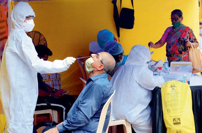 Residents of Sarova Complex get tested at a camp at Kandivli. Pics/Satej Shinde
