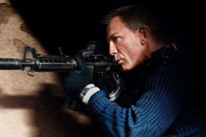 New No Time To Die action poster features Craig taking aim at enemies