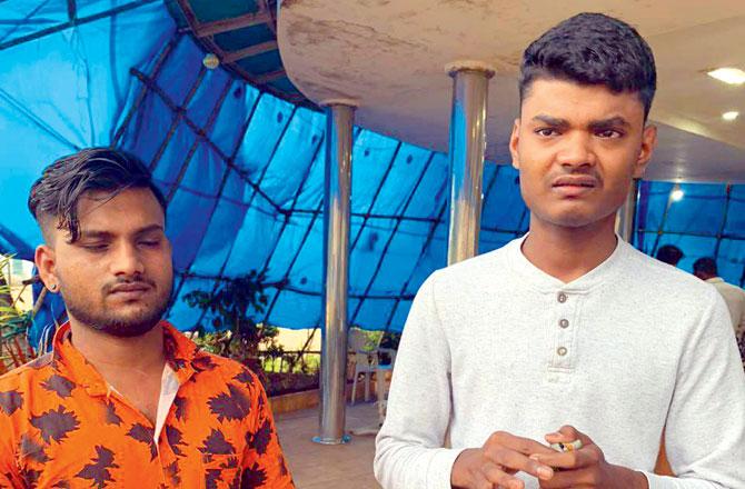 Rampratap Paswan and Prakash Binge, the caretakers who assaulted the stray animals