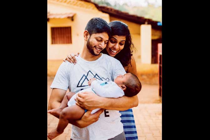 The couple hold their first child, Jacob, just after he was brought home from Jharkhand. PIC/Rahul D’Souza