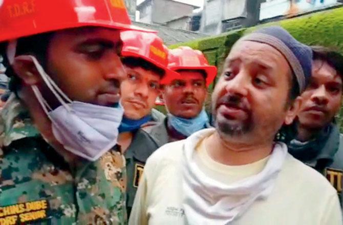 Khalid Abdullah Khan was rescued after spending hours under the debris