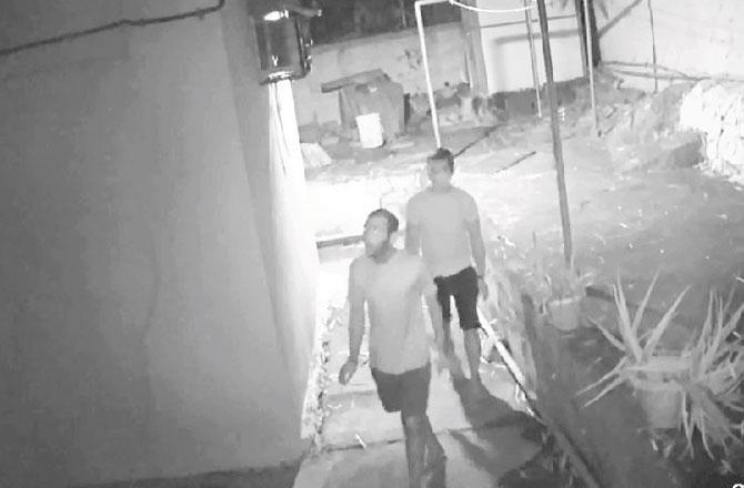 A CCTV grab shows robbers entering a house in IC Colony