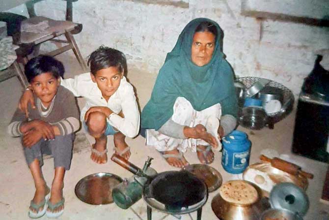 Tajinder Kumar with his brother Harish Kumar and mother Bimla Devi at their Ludhiana home; (left) with his parents Bimla Devi and Om Prakash in Australia