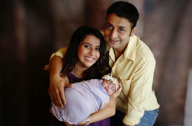 Pranitaa with husband Shivi Pandit and daughter Anysha Pandit