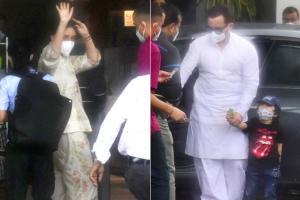 Saif Ali Khan with wife Kareena Kapoor and son Taimur at Mumbai airport Saif Ali Khan with wife Kareena Kapoor and son Taimur at Mumbai airport