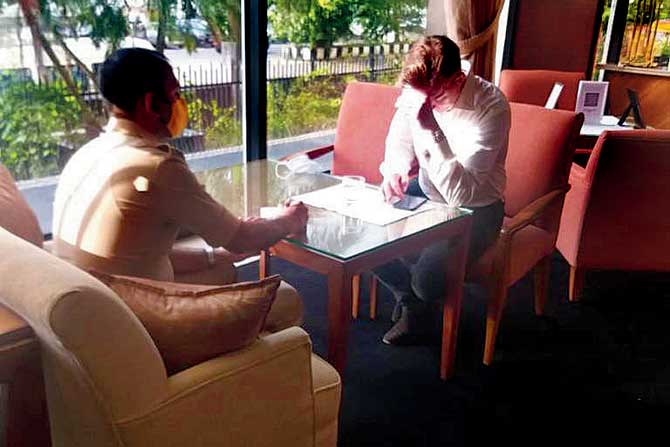 DCP Sangram Singh Nishandar speaks to Brett Lee at the Trident hotel on Thursday
