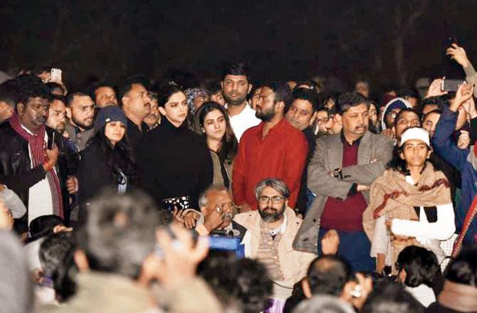 File photo of Deepika Padukone with JNU students attacked on the campus by a mob in January