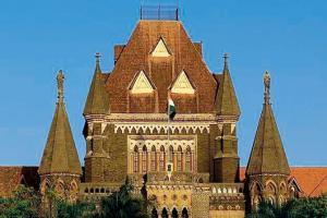 Let lawyers travel in local trains on experimental basis: Bombay HC