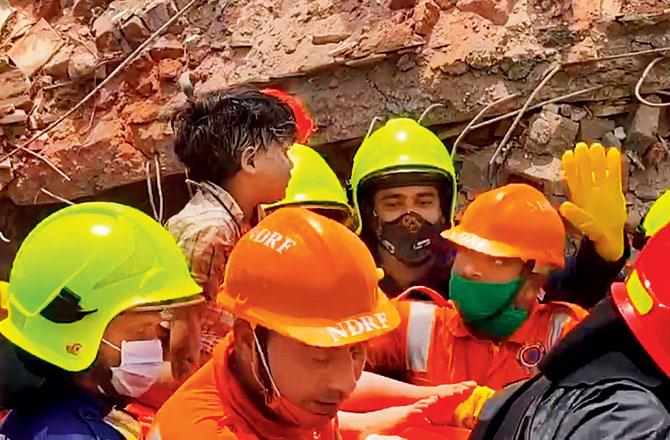 A four-year-old boy was pulled out of the debris 15 hours after the collapse