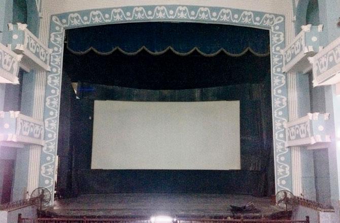 View of the interior where an orchestral music pit beneath the stage is still intact