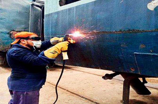 Plasma cutting, an alternative to using oxygen cylinders for the work, at the CR Parel Workshop