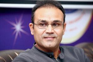 Sehwag takes jibe at umpire on Twitter for dubious 'short run' decision