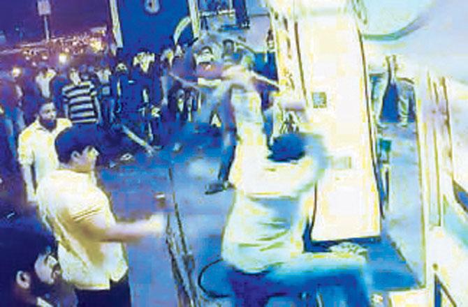 CCTV grabs of the attack at the petrol pump at Manikpur on Friday. Pics/Hanif Patel