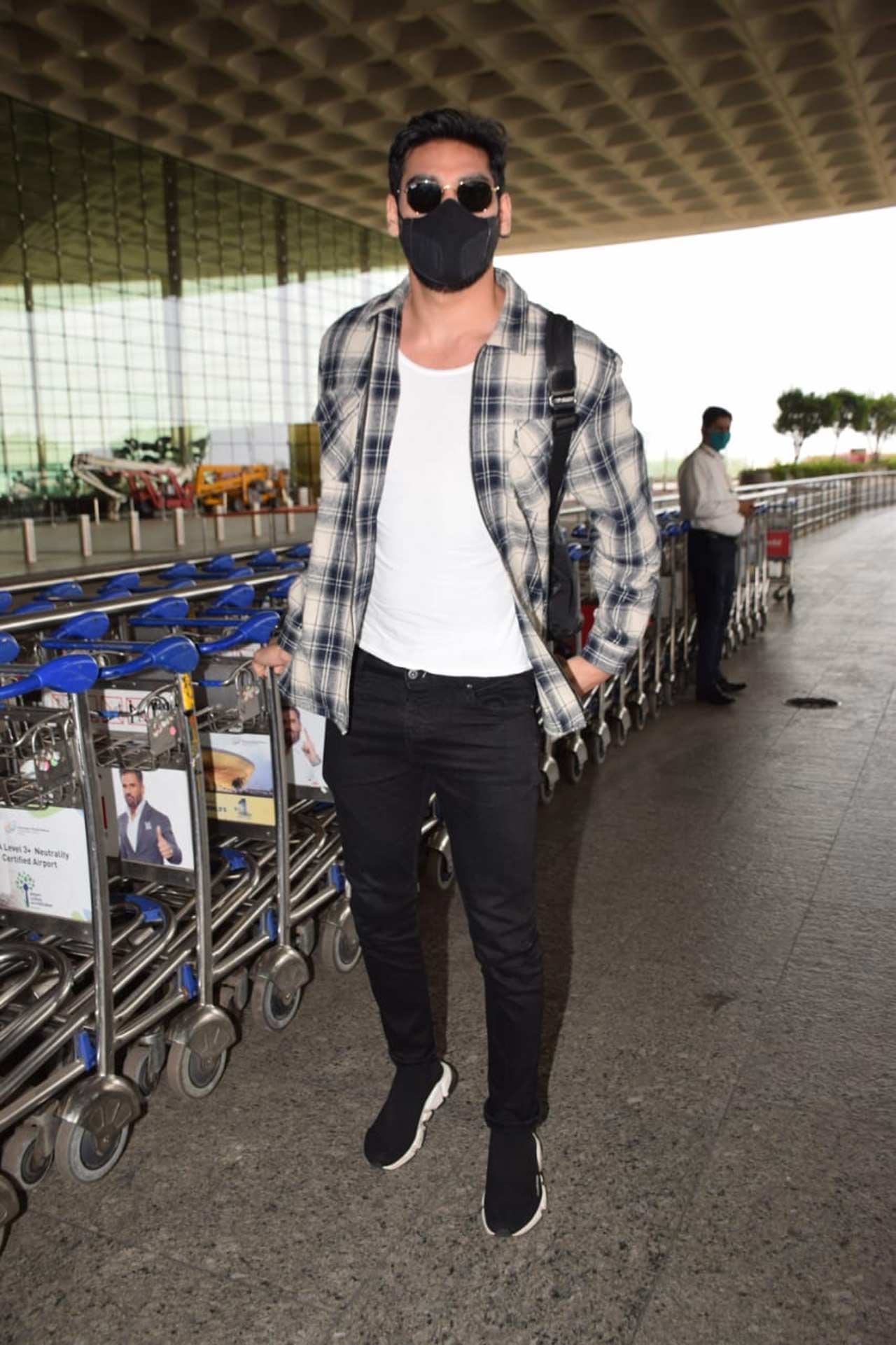 Suniel Shetty's son Ahan, who is all set to make his Bollywood debut opposite Tara Sutaria with Tadap, was also snapped at the Mumbai airport with a friend.