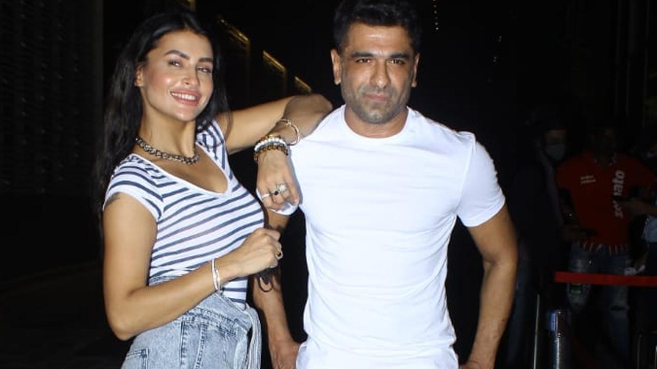 Telly world's one of the most popular couples, Pavitra Punia and Eijaz Khan were clicked outside a luxurious sky-rise building in Andheri, Mumbai. The couple was all smiles as the paparazzi clicked them. While Pavitra opted for a striped t-shirt and high-waisted denim pants, Eijaz was seen in a white t-shirt and brown trouser.