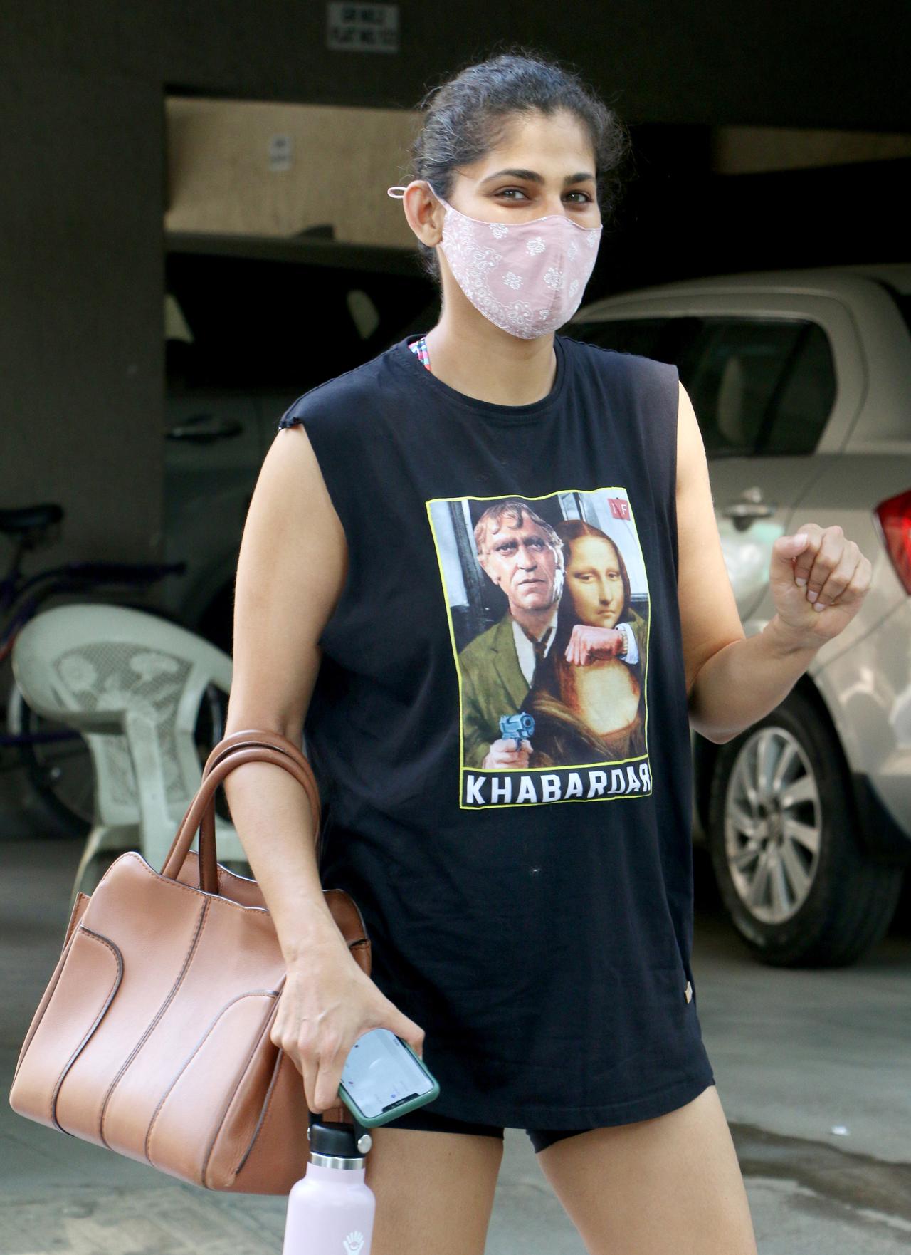 Kubbra Sait was snapped in her gym gears in Bandra, Mumbai. The print on Kubbra's t-shirt, which read 