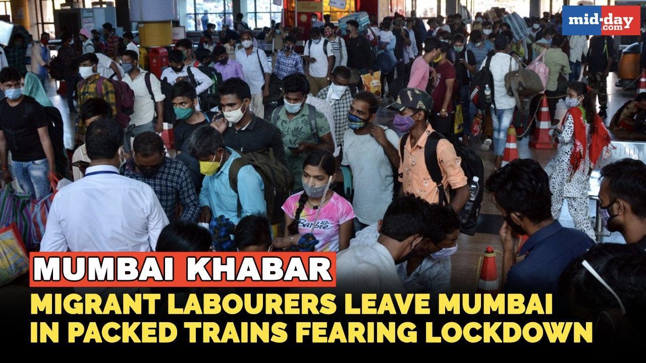 Mumbai's migrant labourers leave in packed trains fearing lockdown 