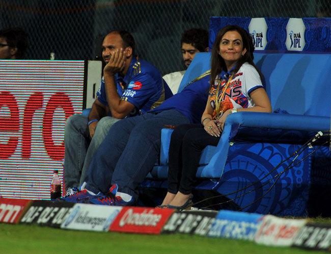 Chair-leader!:  Owner of Mumbai Indians team, Nita Ambani (R), watches her team play and cheers them on from the front during the IPL cricket match between Chennai Super Kings and Mumbai Indians at the M. A. Chidambaram Stadium in Chennai on April 4, 2012