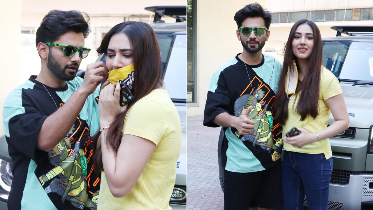 Rahul Vaidya and his fiancee Disha Parmar were snapped in Andheri. The couple, who is fondly called 'Dishul' by their fans, stepped out for a test drive of a luxury car. While posing for the paparazzi, looks like Disha’s mask was stuck in her earring, but Rahul was quick to help his ladylove.