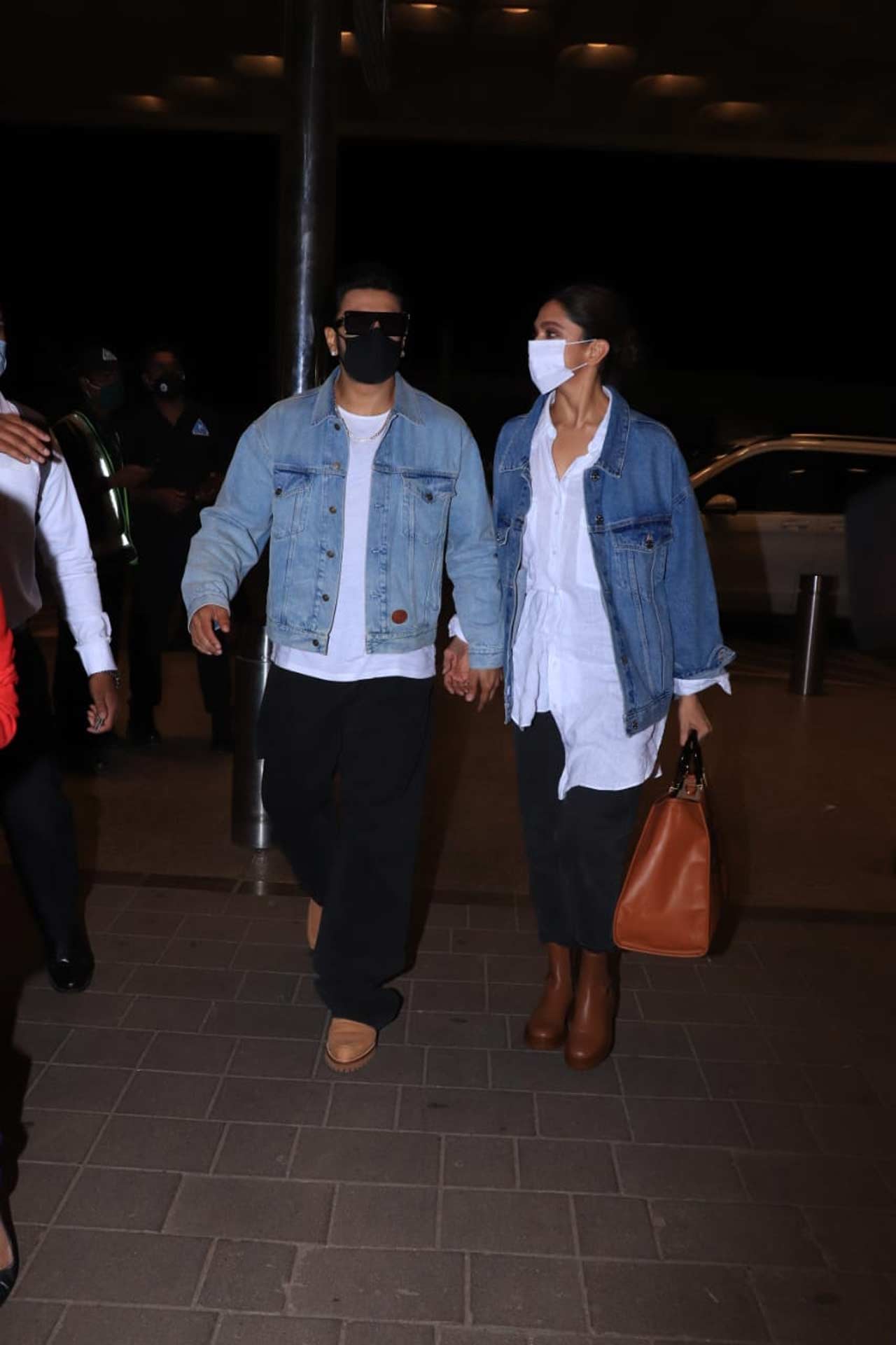 Deepika Padukone and Ranveer Singh were clicked twinning at the Mumbai airport. The duo was snapped sported a denim jacket, paired with a white casual shirt and black pants. On the work front, DeepVeer will once again sizzle on the screen with their appearance in Kabir Khan's 83 film. All pictures/Yogen shah