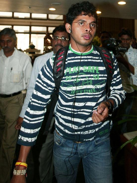 Troubles tunes?:  Sreesanth arrives at the Taj Residency Ummed in Ahmedabad on May 9, 2008, for a meeting regarding the slap-gate incident with Harbhajan Singh during a match of the Indian Premier League (IPL)