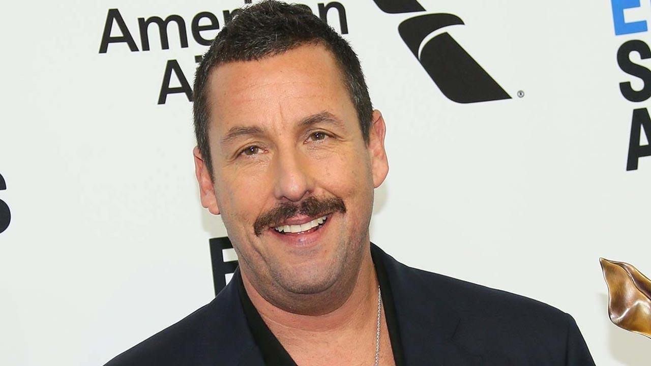 Adam Sandler hits beach during Spain getaway, amid filming for 'Hustle'