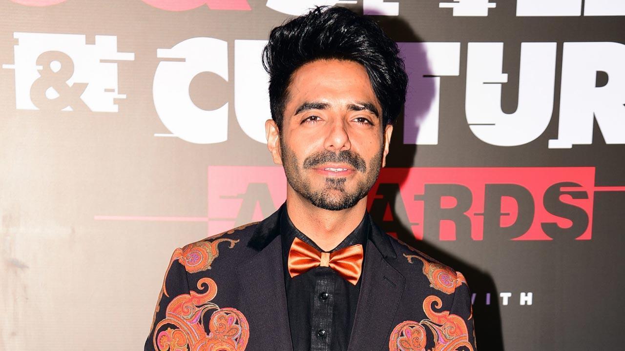 Aparshakti Khurana shares a glimpse of his daughter, says ‘It’s a happy love triangle for life’