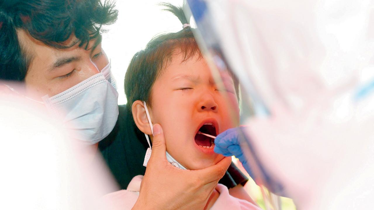 Covid-19 resurgence brings back testing in Wuhan