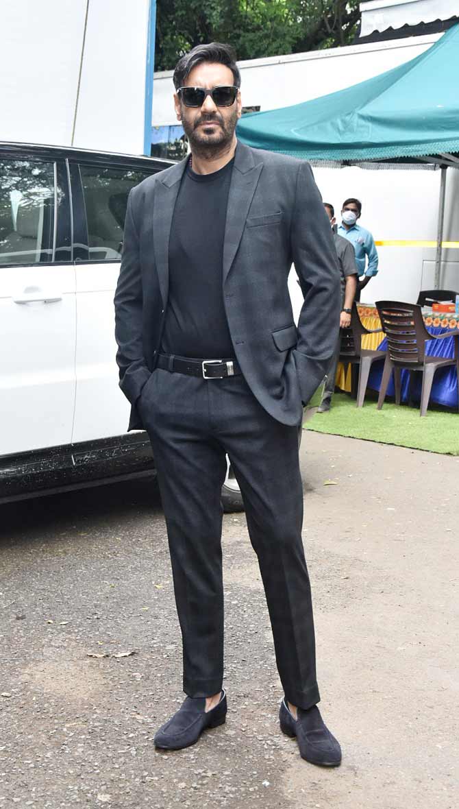 Ajay Devgn looked dapper in a black suit teamed up with black sunglasses. Devgn will portray the role of Squadron Leader Vijay Karnik in the film.