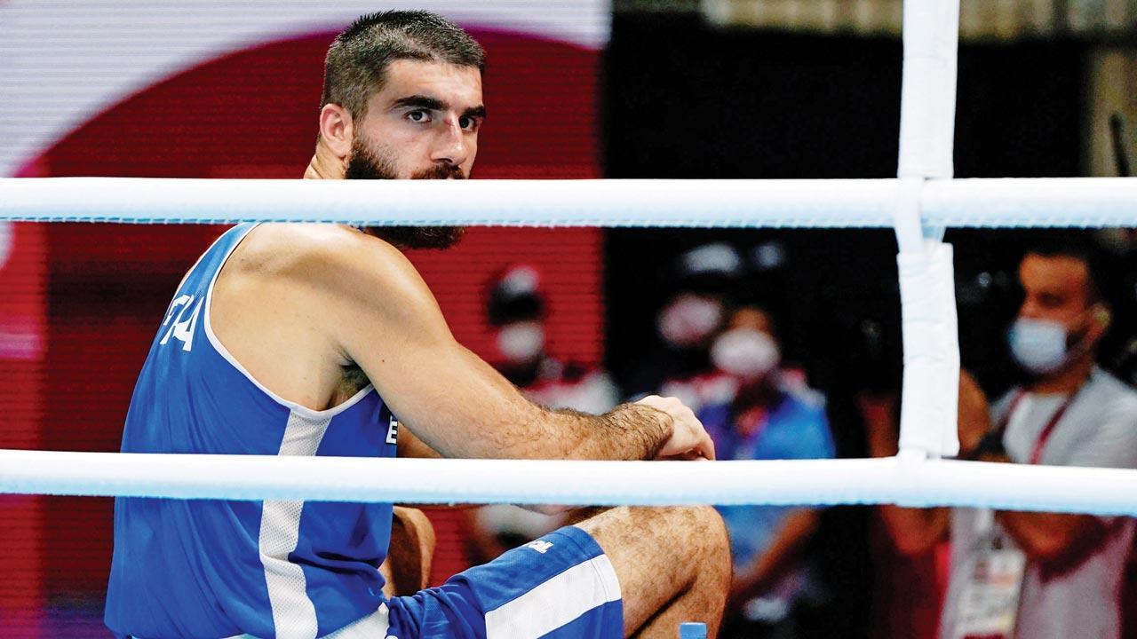 French boxer stages ringside sit-in protest alleging injustice
