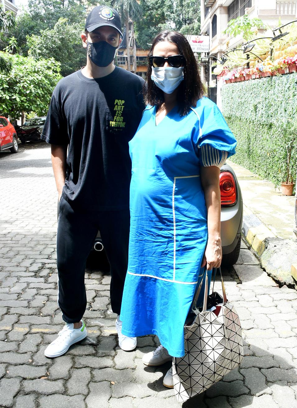 Mom-to-be Neha Dhupia dressed in a blue dress with her husband Angad Bedi was clicked at a popular clinic in Bandra. The couple recently announced second pregnancy. Angad and Neha are parents to two-year-old Mehr Dhupia Bedi. The couple got married in 2018 in Delhi, and they celebrated three years of togetherness back on May 10, 2021.