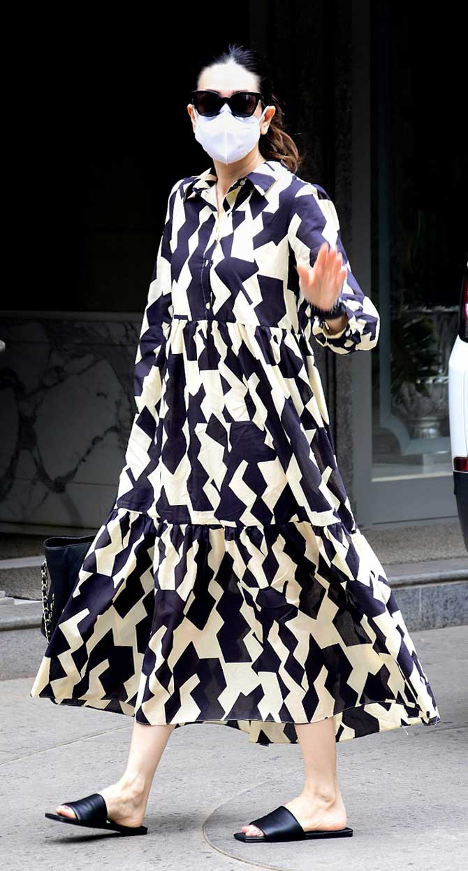 Karisma Kapoor, too, was snapped at Randhir Kapoor's house in Bandra, Mumbai. The actress looked chic in a breezy black and white dress.