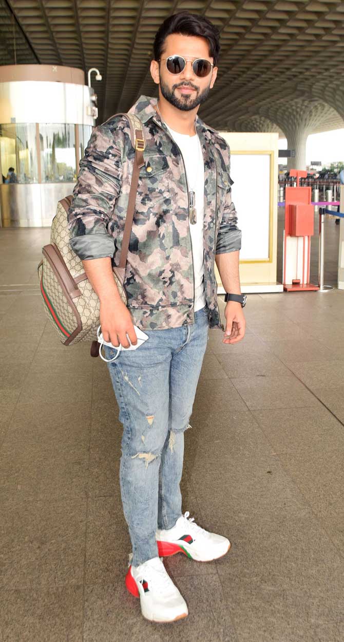 Rahul Vaidya was also spotted at Mumbai airport. The singer opted for a white t-shirt, blue jeans and camo jacket for his outing.