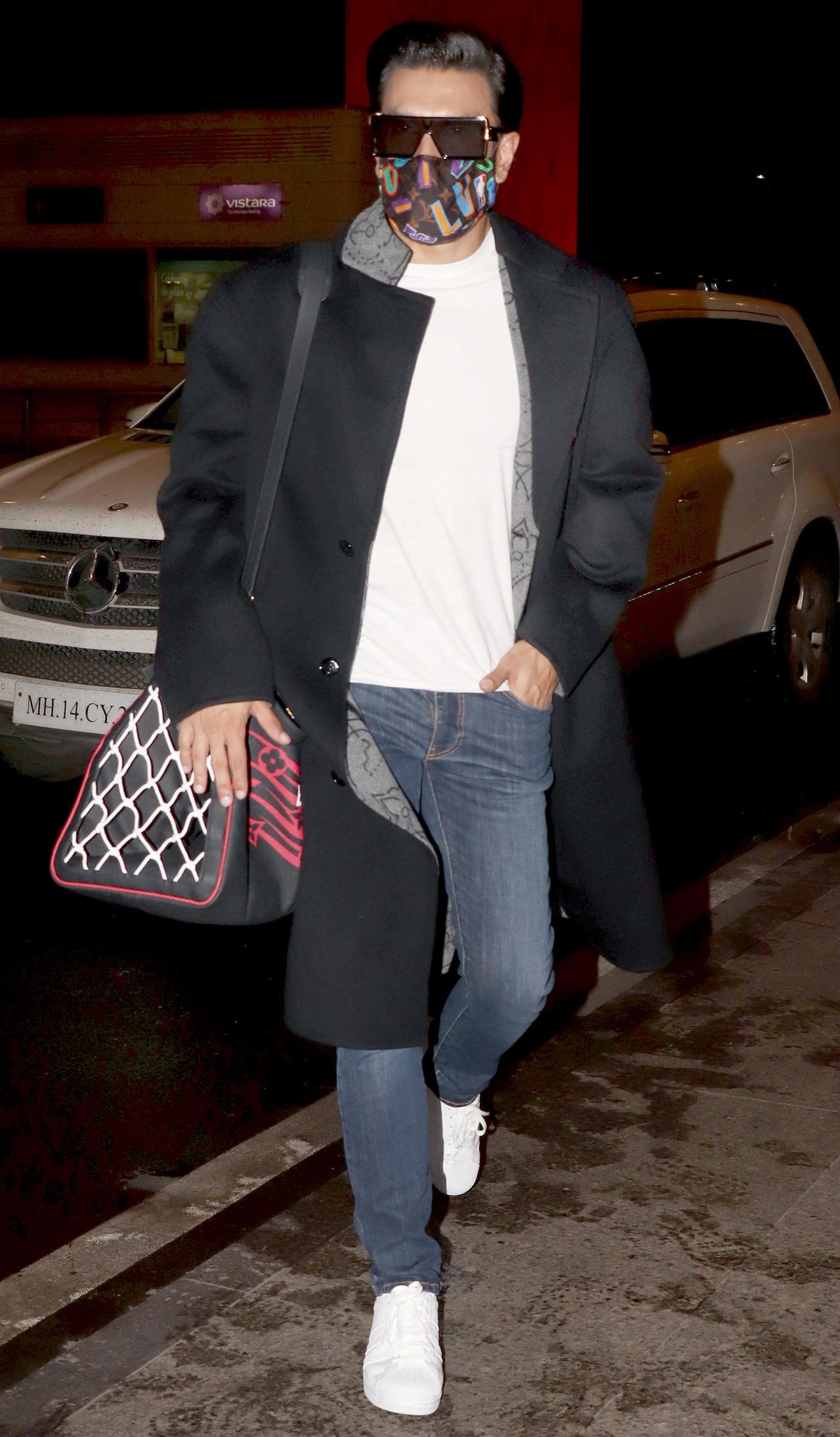 Ranveer Singh looked dashing in his long travel coat, white tee and denim as he arrived at the Mumbai airport.