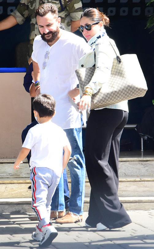 Saif Ali Khan with Kareena Kapoor Khan and Taimur Ali Khan were spotted at the Mumbai airport. The Pataudi family is off on a holiday to celebrate Saif's birthday on August 16.